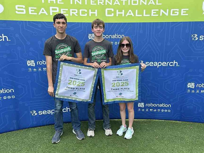 Team members Callen Shaw, Gavin McGinley and Gracie McGinley won second place overall in the senior stock class, as well as third place in both the obstacle course and the technical design report. (Special to The Commercial/University of Arkansas System Division of Agriculture)