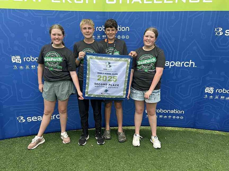 Ella Daniels, Jaxson Andrews, Luke Douthit and Sarah Daniels took home second place in the obstacle course in the junior stock division. (Special to The Commercial/University of Arkansas System Division of Agriculture)