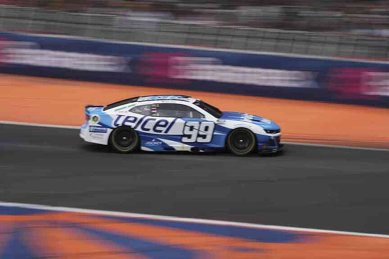 Daniel Suarez drives during a qualifying session for the NASCAR Cup Series auto race at Hermanos Rodriguez race track in Mexico City, Saturday, June 14, 2025. (AP Photo/Fernando Llano)