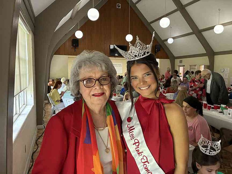Egie Wilson, the first Miss Pink Tomato who won the title 69 years ago, poses with this year's winner, Neely Taylor, 19, of Monticello, on Saturday at the Bradley County All Tomato Luncheon. (Pine Bluff Commercial/Byron Tate)