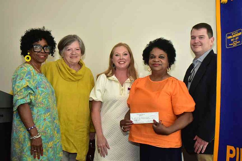 From left: Rosie Clayton and Linda McNulty of Dolly Parton's Imagination Library; Laura Beth Shaner; Linda Bateman of the Imagination Library; and Owen McNulty, secretary of the Rotary Club of Pine Bluff. (Pine Bluff Commercial/I.C. Murrell)