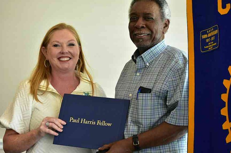 Laura Beth Shaner and Glenn Freeman, Paul Harris Fellow for the Rotary Club. (Pine Bluff Commercial/I.C. Murrell)