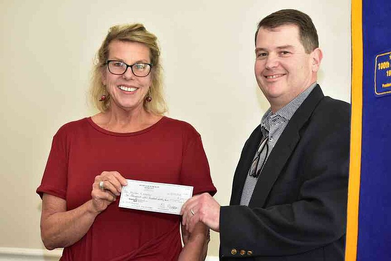 Pat Tate, executive director of Neighbor to Neighbor; and Owen McNulty. (Pine Bluff Commercial/I.C. Murrell)