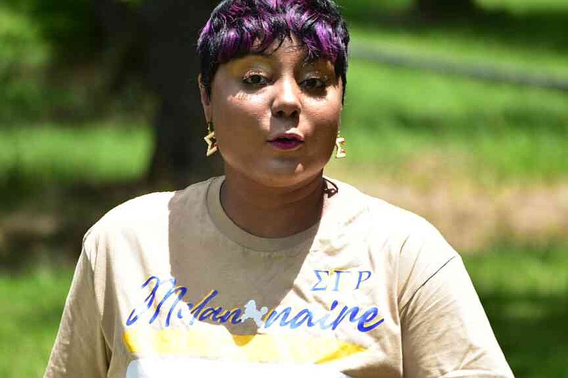 Fordyce Alderwoman Sierra Hempstead speaks at a balloon release marking the one-year anniversary of the mass shooting at a local grocery store. (Pine Bluff Commercial/I.C. Murrell)