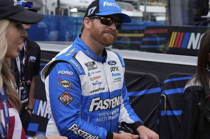 Chris Buescher walks to his car before a NASCAR Cup Series auto race at Hermanos Rodríguez race track in Mexico City, Sunday, June 15, 2025. (AP Photo/Fernando Llano)
