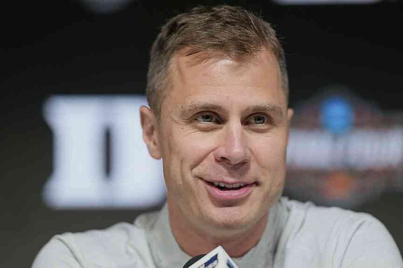 FILE - Duke head coach Jon Scheyer answers a question during media day at the Final Four of the NCAA college basketball tournament, Thursday, April 3, 2025, in San Antonio. (AP Photo/Eric Gay, file)
