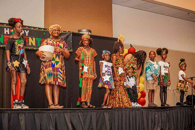 Mr. & Miss Juneteenth Stuttgart contestants eagerly await the announcement of the winners. (Pine Bluff Commercial/Eplunus Colvin)