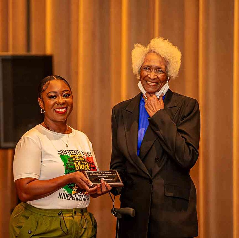 Julia Thomasson, right, is recognized with the Community Trailblazer Award. Presenting the award is Carriell Brown, Stuttgart Juenteenth Pageant and Awards host. (Pine Bluff Commercial/Eplunus Colvin)