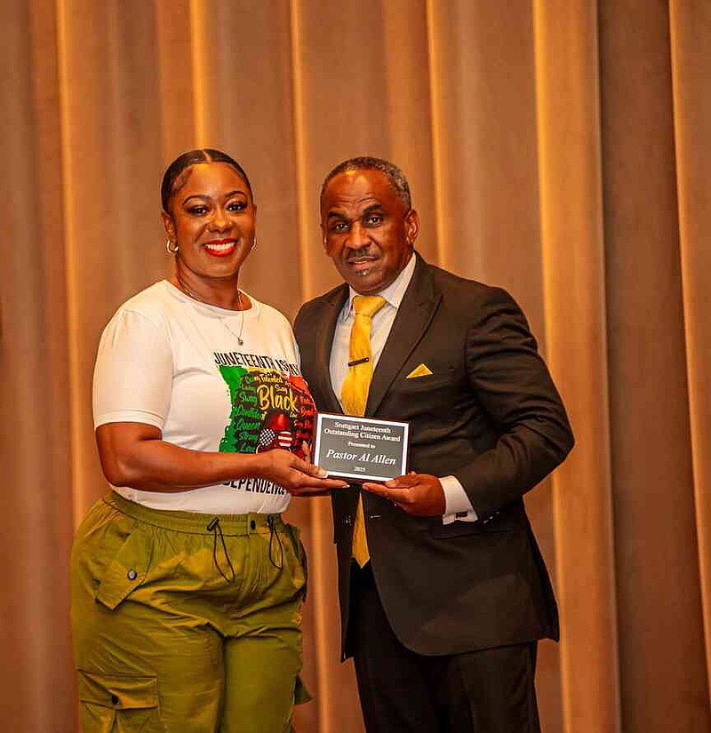 Pastor Al Allen receives the Community Legacy Service Award from Carriell Brown. (Pine Bluff Commercial/Eplunus Colvin)