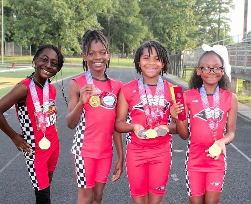 The 10-year-old 4x400-meter relay team of Z'Niyha Proctor, London Hinton, Ka'Leigh Piggie and Riley Allen. (Special to The Commercial)