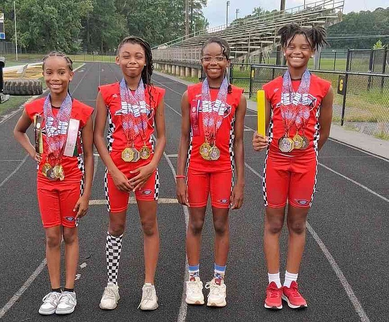 The 12-year-old 4x100-meter relay team of Khalie Piggie, Ariel Hargraves, Naomi Battles and Akyre Ento.