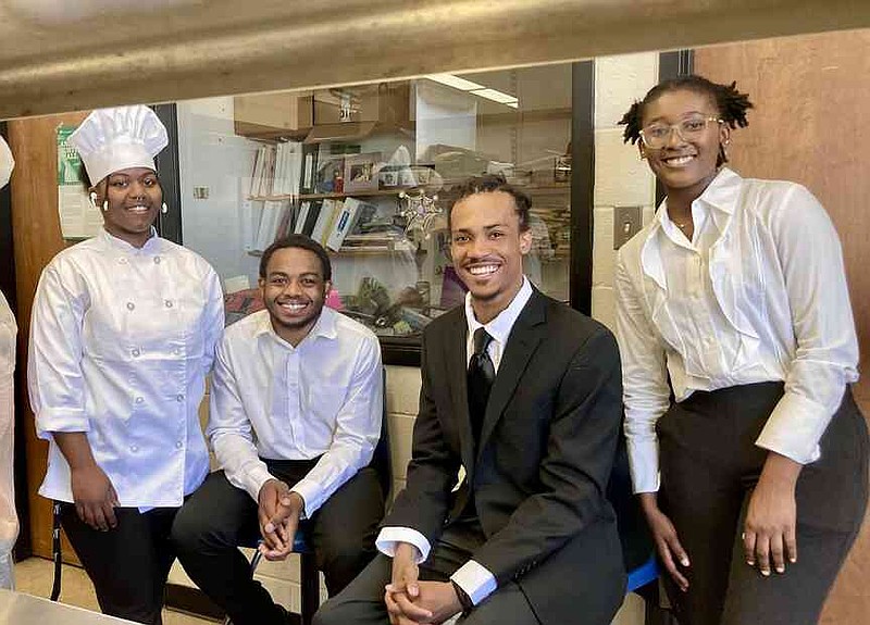Students of UAPB's hospitality and tourism management program are shown at a dinner to mark the accreditation of the UAPB Department of Human Sciences by the American Association of Family and Consumer Sciences. They are Maria Bradley, left, Logan Bates, David Roseman and Denise Reed-Thomas. (Special to The Commercial/University of Arkansas at Pine Bluff)