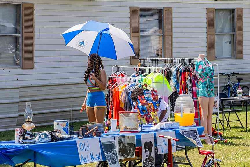 Rock Island history artifacts and photos line the streets of Rock Island during Rock Island Day in Stuttgart. (Pine Bluff Commercial/Eplunus Colvin)
