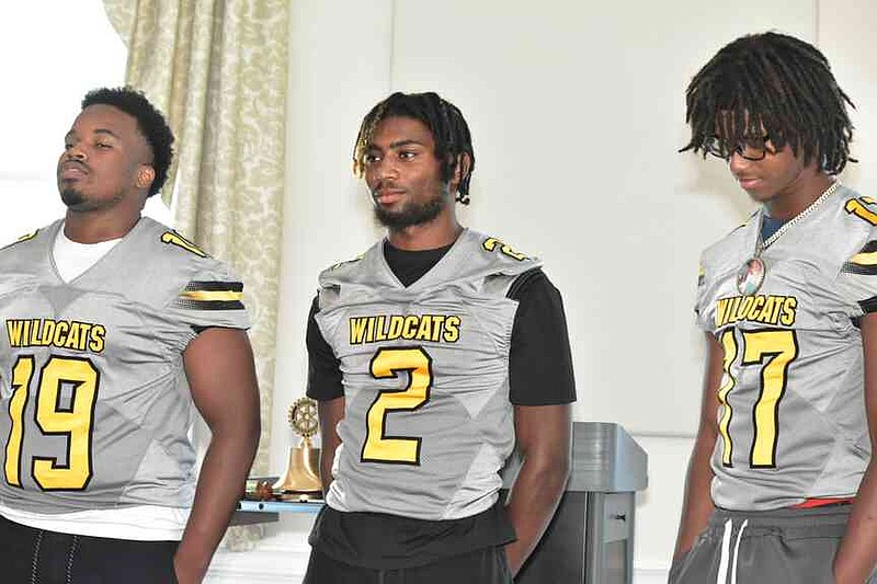 From left: Defensive end Keiran Smith, quarterback Malachi Rayford and wide receiver Jaylen Wilkerson are introduced at the Rotary Club of West Pine Bluff's 10th annual Hooten's Arkansas Football luncheon Thursday, July 17, 2025, at the Pine Bluff Country Club. (Pine Bluff Commercial/I.C. Murrell)