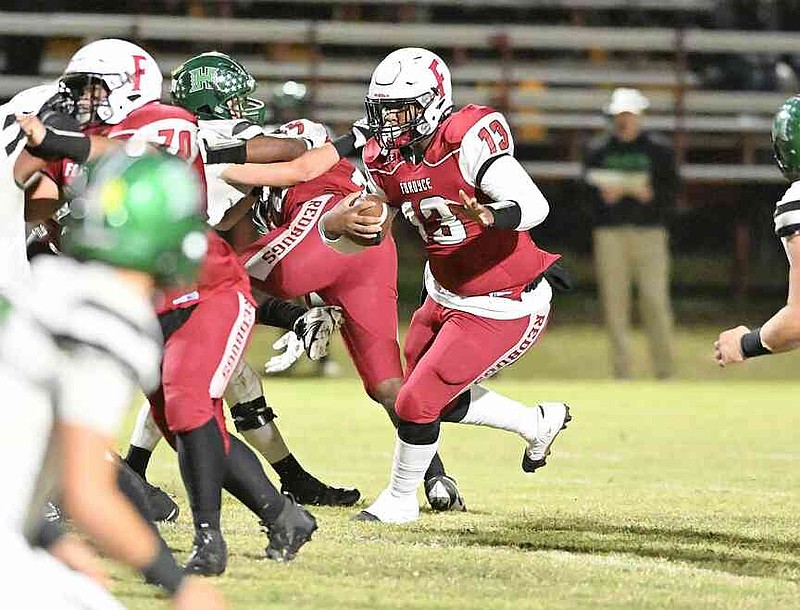 Fordyce quarterback Andreal Ellison Jr. carries the ball against Hoxie. (Special to The Commercial/William Harvey)