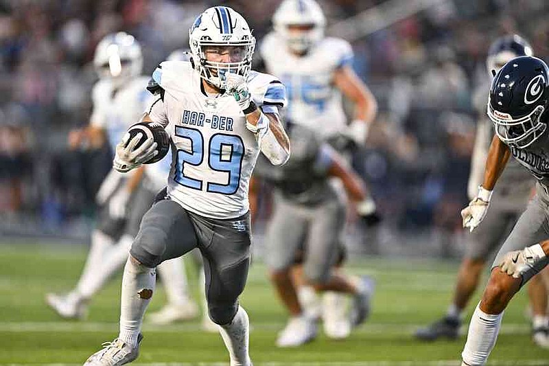 Springdale Har-Ber running back Titus Cramer (29) scores a touchdown run, Friday, Sept. 13, 2024, during the first quarter against Greenwood at Smith-Robinson Stadium in Greenwood. Cramer, the Wildcats' leading rusher last year, is now at Rogers for his senior season. (River Valley Democrat-Gazette/Hank Layton)