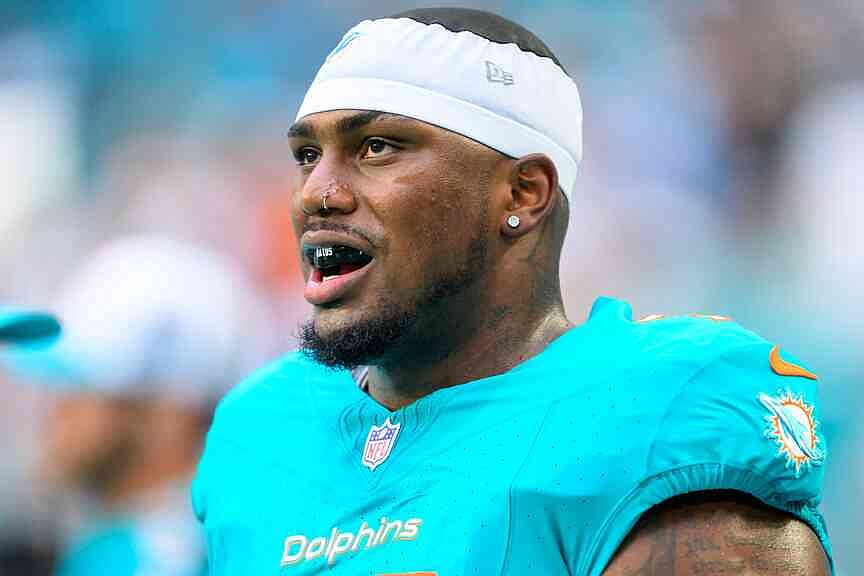 Dolphins lineman stable, remains in hospital