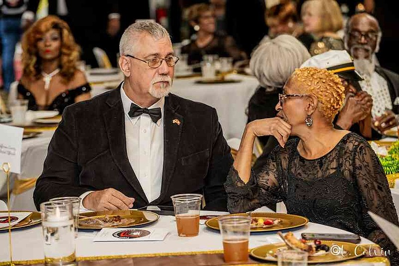 Jefferson County Justices of the Peace Richard Victorino and Melanie Dumas visit with one another. (Pine Bluff Commercial/Eplunus Colvin)