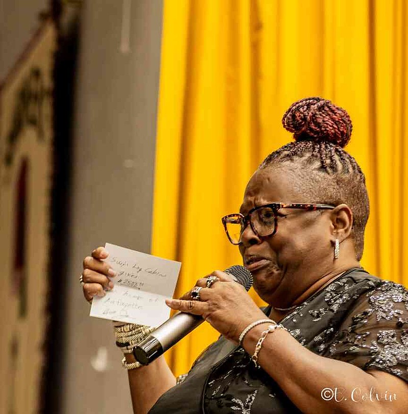 First Ward Living Grace Pantry Executive Director Deborah Allen is overcome with emotion after receiving a generous donation. (Pine Bluff Commercial/Eplunus Colvin)