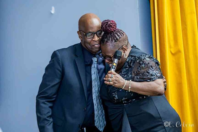 Judge Earnest Brown Jr. of the 11th West Judicial Circuit Sixth Division embraces Deborah Allen. (Pine Bluff Commercial/Eplunus Colvin)