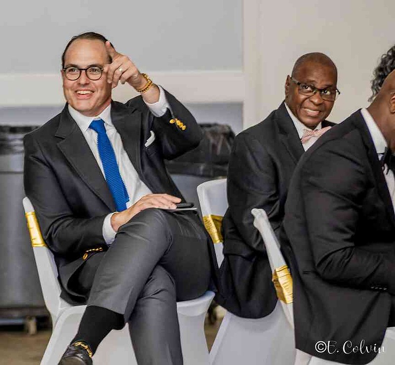 Carlton Saffa, chief marketing officer of Saracen Casino, and state Rep. Ken Ferguson, D-Pine Bluff, share a few laughs during the VIP toast. (Pine Bluff Commercial/Eplunus Colvin)