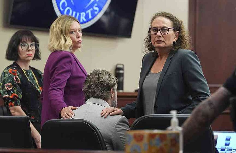 Dentist sentenced to life in prison for wife’s killing | Northwest ...