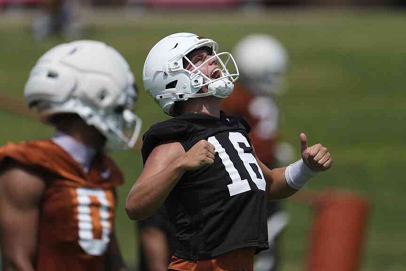 Texas quarterback Arch Manning (16) reacts during an NCAA college football practice in Austin, Texas, on Wednesday. (AP Photo/Eric Gay)