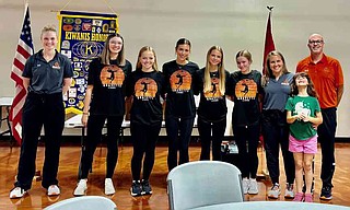 Submitted photo Members of the Gravette High School volleyball team spoke at the Friday, August 1, meeting of the Gravette Kiwanis Club. The girls' first home game will be on August 25. Pictured are (left to right) Coach Addison Duke, team members Kayla Chandler, Bailey Flynt, Emma Renfrow, Adalyn Jones, and Kennedy Flynt, assistant coaches Melissa Witcher and James McVay, and Coach McVay's daughter, Roxanna.