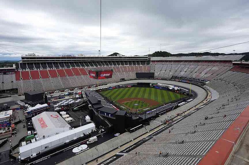 Members of the grounds crew prepare the field prior to the MLB Speedway Classic baseball game at Bristol Motor Speedway in Bristol, Tenn., Saturday, Aug. 2, 2025. (AP Photo/George Walker IV)