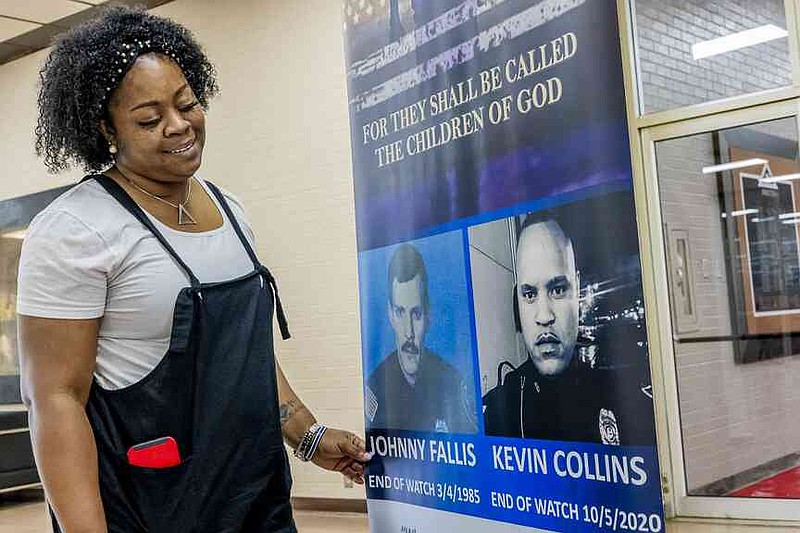 Carmen Bell shares her heartfelt connection to National Night Out while admiring her brother, the late Pine Bluff Police Detective Kevin Collins. (Pine Bluff Commercial/Eplunus Colvin)