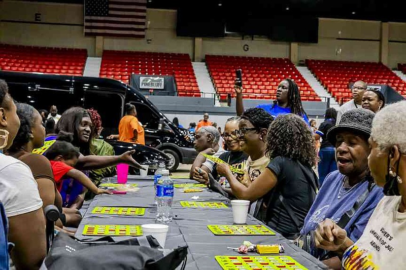 Attendees enjoy Bingo with chances to win prizes. (Pine Bluff Commercial/Eplunus Colvin)