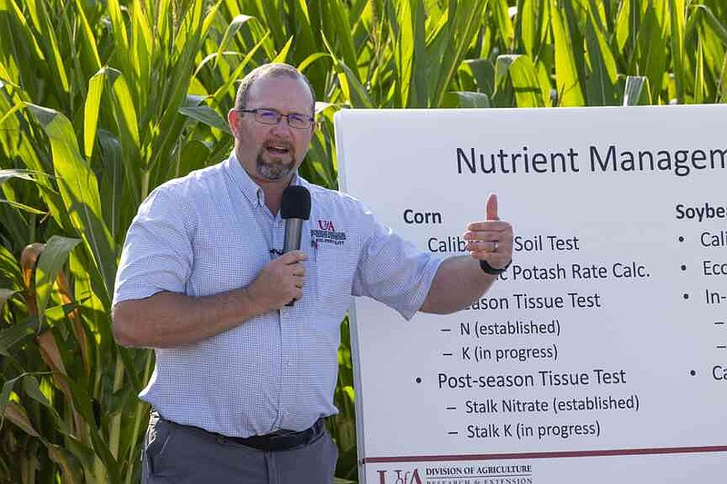 Trent Roberts, professor of soil fertility and soil testing, discusses in-season management of potassium in corn and soybean at the 2025 NERREC Rice and Row Crop Field Day July 31. (Special to The Commercial/University of Arkansas System Division of Agriculture)