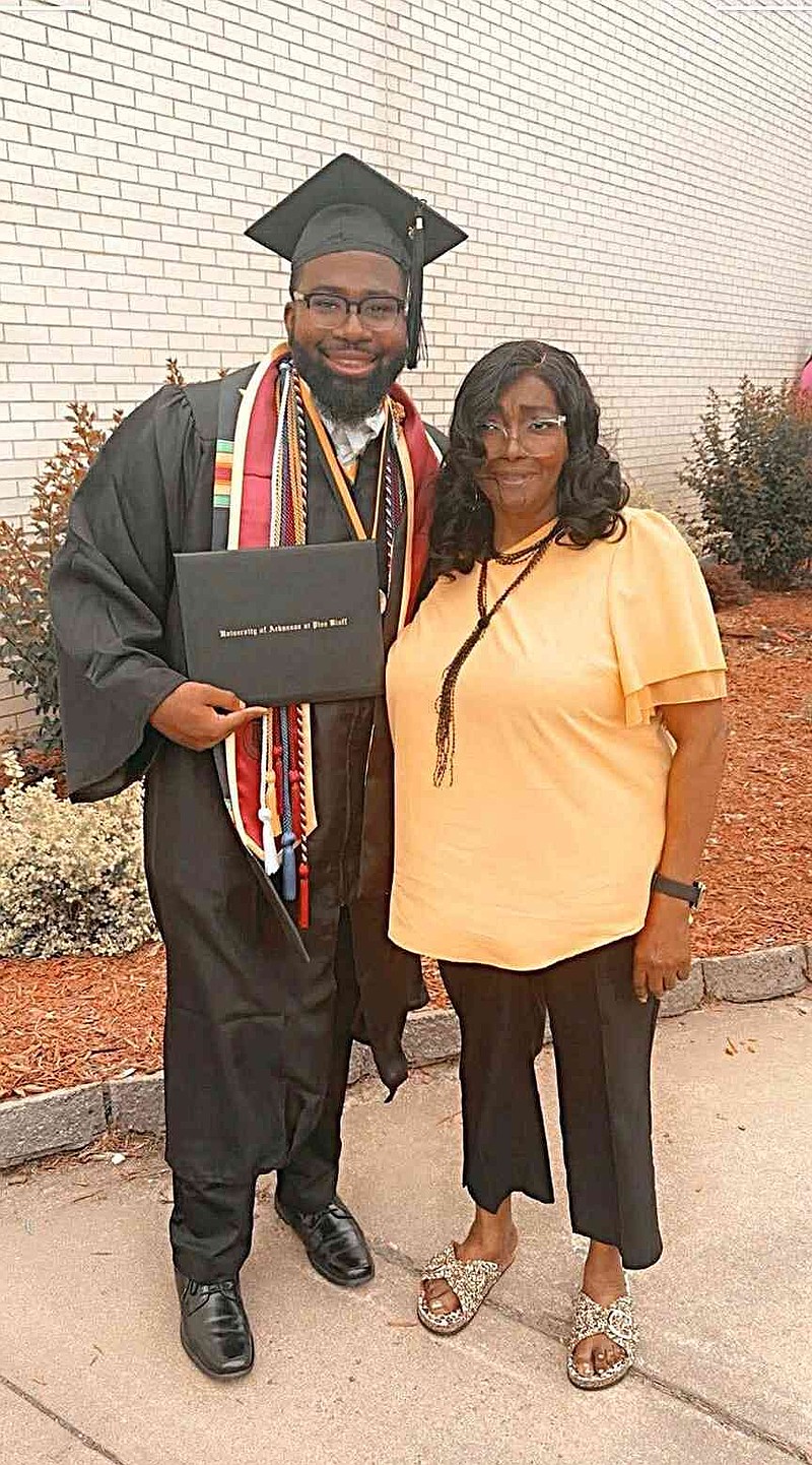 J'Keile Hadley, left, displays his degree from the University of Arkansas at Pine Bluff in May with Debbie Nimmer, his grandmother and alumna of Arkansas Agricultural, Mechanical, and Normal College (now UAPB). (Special to The Commercial)