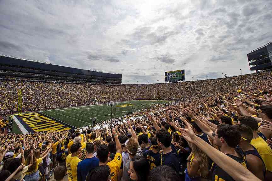 Michigan, Moore face NCAA fines