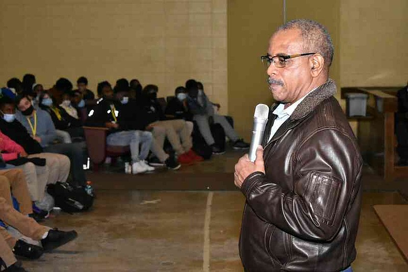 Terry Alexander speaks to Watson Chapel Junior High School students about his career at a Black history assembly Feb. 23, 2022. Alexander, the University of Arkansas at Monticello's 2021 Distinguished Alumnus, was an All-America running back at UAM and worked for International Paper and Weyerhaeuser before retiring in 2019. (Pine Bluff Commercial/I.C. Murrell)