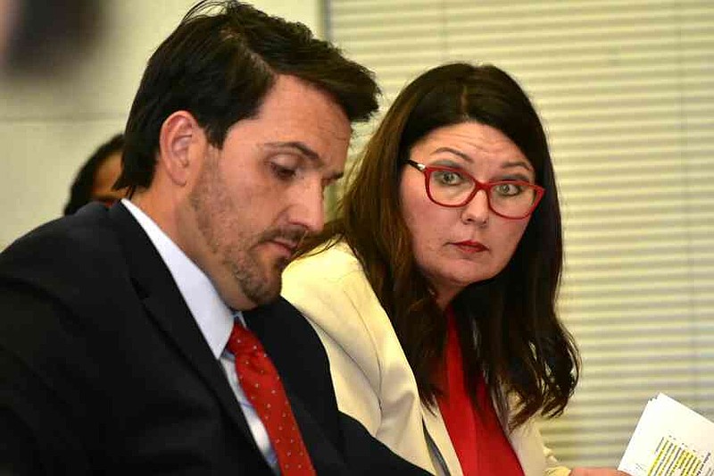 Pine Bluff School District Superintendent Jennifer Barbaree listens to comments by district-level employee Monica McMurray, not pictured, as PBSD Attorney Cody Kees takes notes Monday, Aug. 25, 2025. (Pine Bluff Commercial/I.C. Murrell)