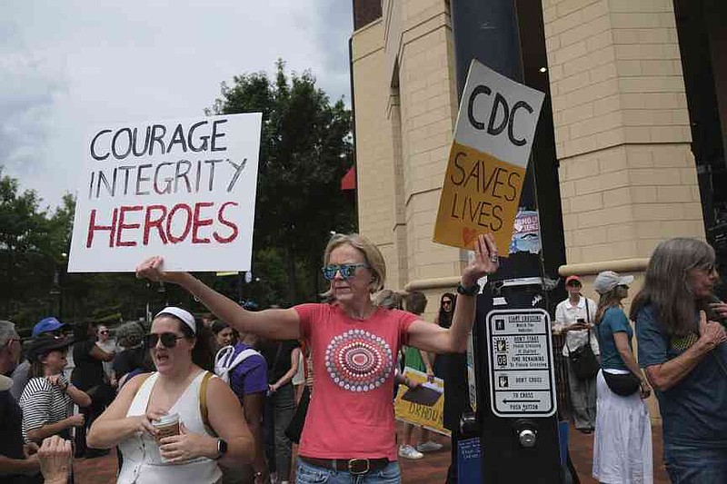 Workers and supporters gather to rally for the departing scientific leaders at the Centers for Disease Control and Prevention outside the CDC headquarters, Thursday, Aug. 28, 2025, in Atlanta. (AP Photo/Ben Gray)