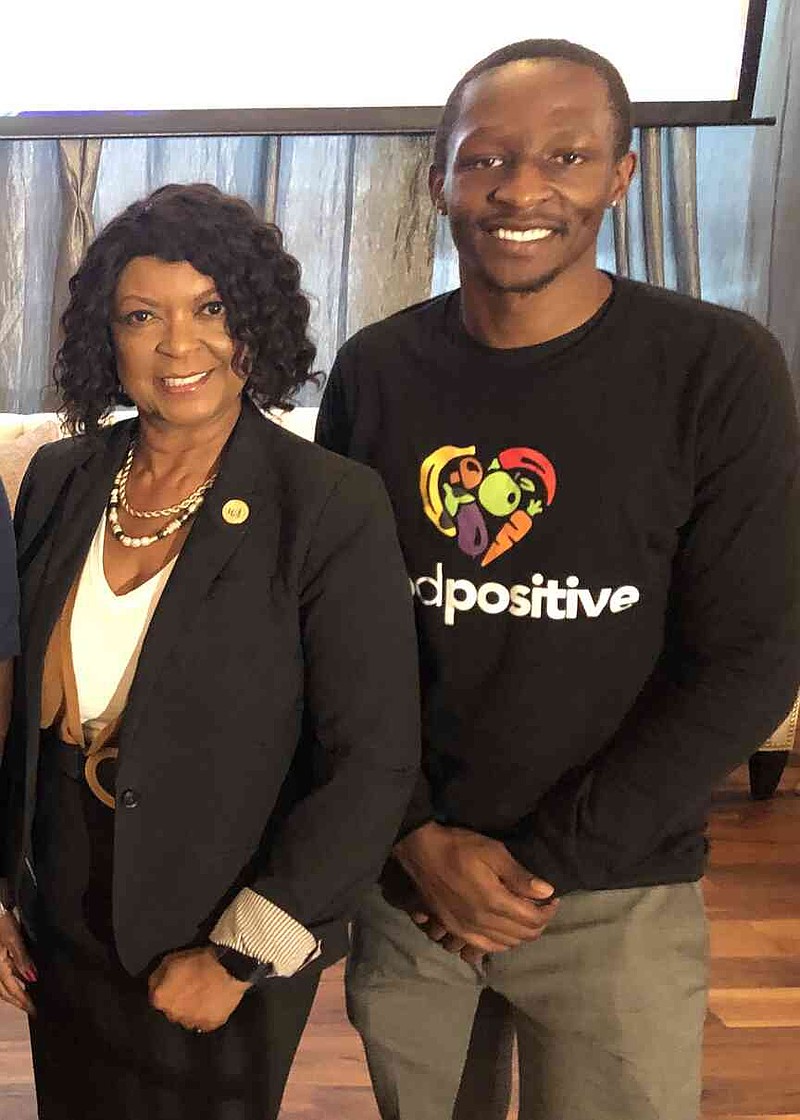 Suzzette Shaw Goldmon, left, UAPB associate professor and coordinator of the university's Hospitality and Tourism Management Program, and senior David Opiri are shown at the Arkansas State of Minority Health Conference. Opiri credits Goldmon with helping him choose his educational and career paths. (Special to The Commercial/University of Arkansas at Pine Bluff)