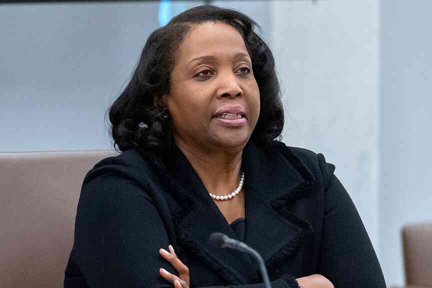 Lawyers clash on cause to dismiss Fed governor
