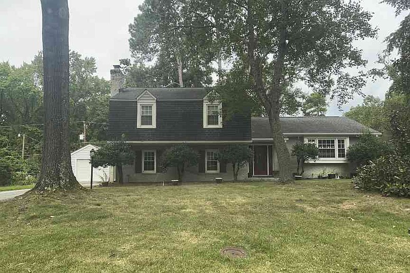 This home in a suburb of Richmond, Va., is listed as the headquarters of Acquisition Logistics LLC, a small business that won a contract from the Trump administration worth up to $1.2 billion to build and operate what is expected to be the nation's largest immigrant detention facility inside a U.S. Army base in Texas. Property records show the house belongs to Kenneth A. Wagner, the president and CEO of the company. (AP Photo/Alan Suderman)