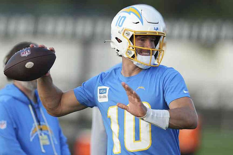 Los Angeles Chargers quarterback Justin Herbert throws the ball during a training session prior to an NFL football game against the Kansas City Chiefs in Sao Paulo, Wednesday, Sept. 3, 2025. (AP Photo/Fernando Llano)