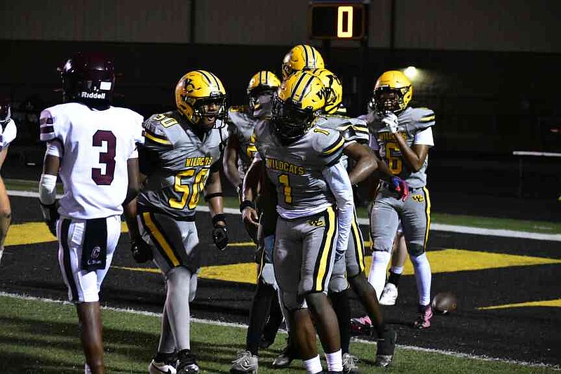 Watson Chapel wide receiver Jakylinn Battles (1) celebrates with teammates after a second-quarter touchdown reception against Crossett. (Pine Bluff Commercial/I.C. Murrell)