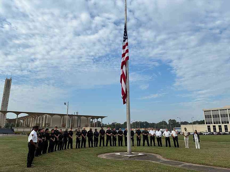 Members of the Pine Bluff Fire Department gather on Thursday morning, as they do every Sept. 11th, to remember the firefighters who lost their lives 24 years ago during 9/11. (Pine Bluff Commercial/Byron Tate)