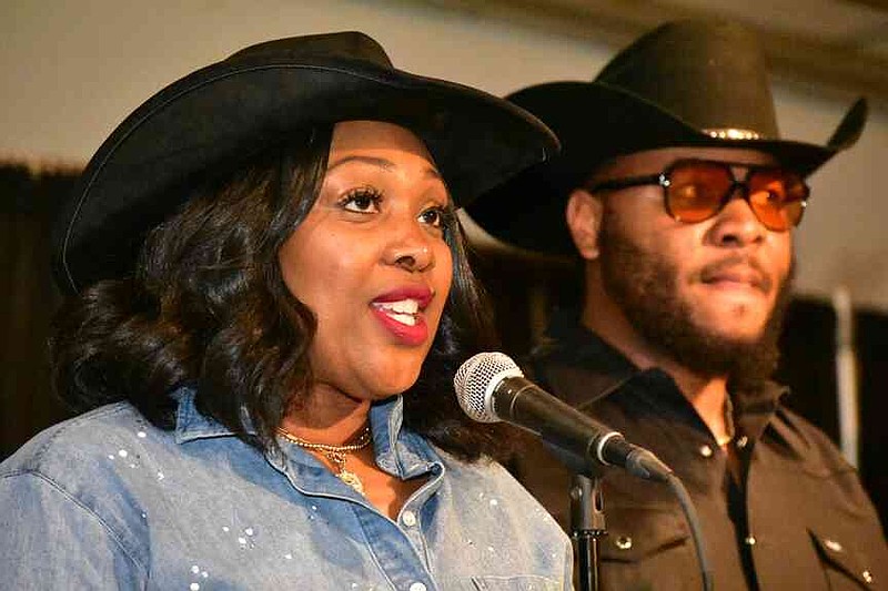 Tish Bullard and Jamal Gordon of the Jefferson County Young Professionals Network address attendees. (Pine Bluff Commercial/I.C. Murrell)