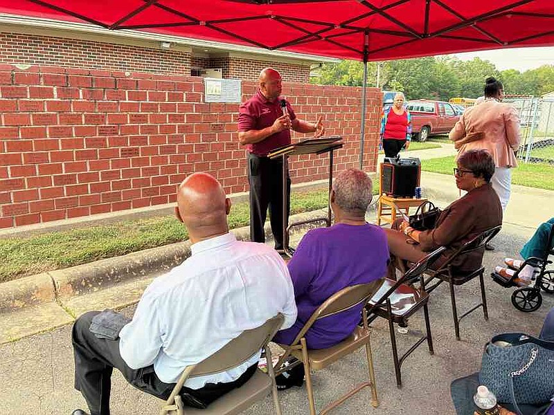 Jefferson County Judge Gerald Robinson reads a proclamation in acknowledgement of the opening of the Merrill Historical Museum. (Pine Bluff Commercial/Byron Tate)