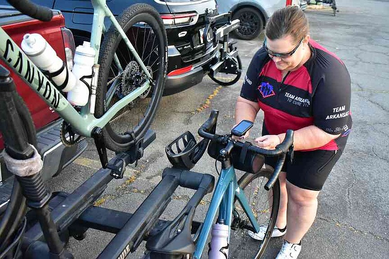 Debbie Pharr of Maumelle preps for her Tour de Bluff ride. (Pine Bluff Commercial/I.C. Murrell)