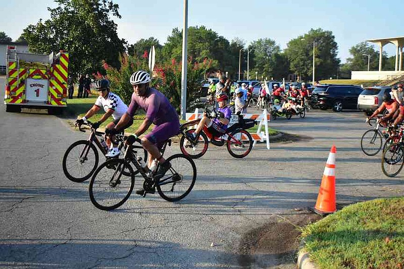 More than 100 bikers take off from the Pine Bluff Civic Center for the start of Tour de Bluff on Saturday morning, Sept. 20, 2025. (Pine Bluff Commercial/I.C. Murrell)
