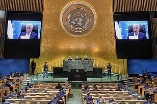 Palestinian President President Mahmoud Abbas addresses the 80th session of the United Nations General Assembly via video, Thursday, Sept. 25, 2025. (AP Photo/Richard Drew)