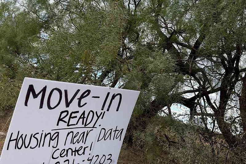 A sign advertises housing for workers along the road to the Stargate artificial intelligence data center complex on Monday, Sept. 22, 2025. (AP Photo/Matt O'Brien)