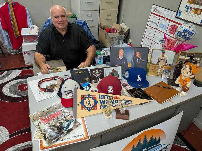 Jeff Gross, Taylor Field manager, has plenty of memorabilia from the ballpark and elsewhere on his desk. (Pine Bluff Commercial/I.C. Murrell)